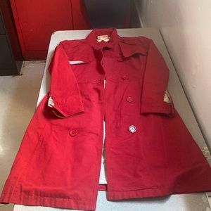 One red tench coat jacket. Has some staining on the inside. Decent condition.